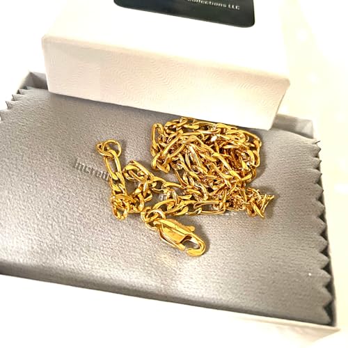 24K gold filled Figaro chain necklace displayed in a gift box on soft gray fabric.